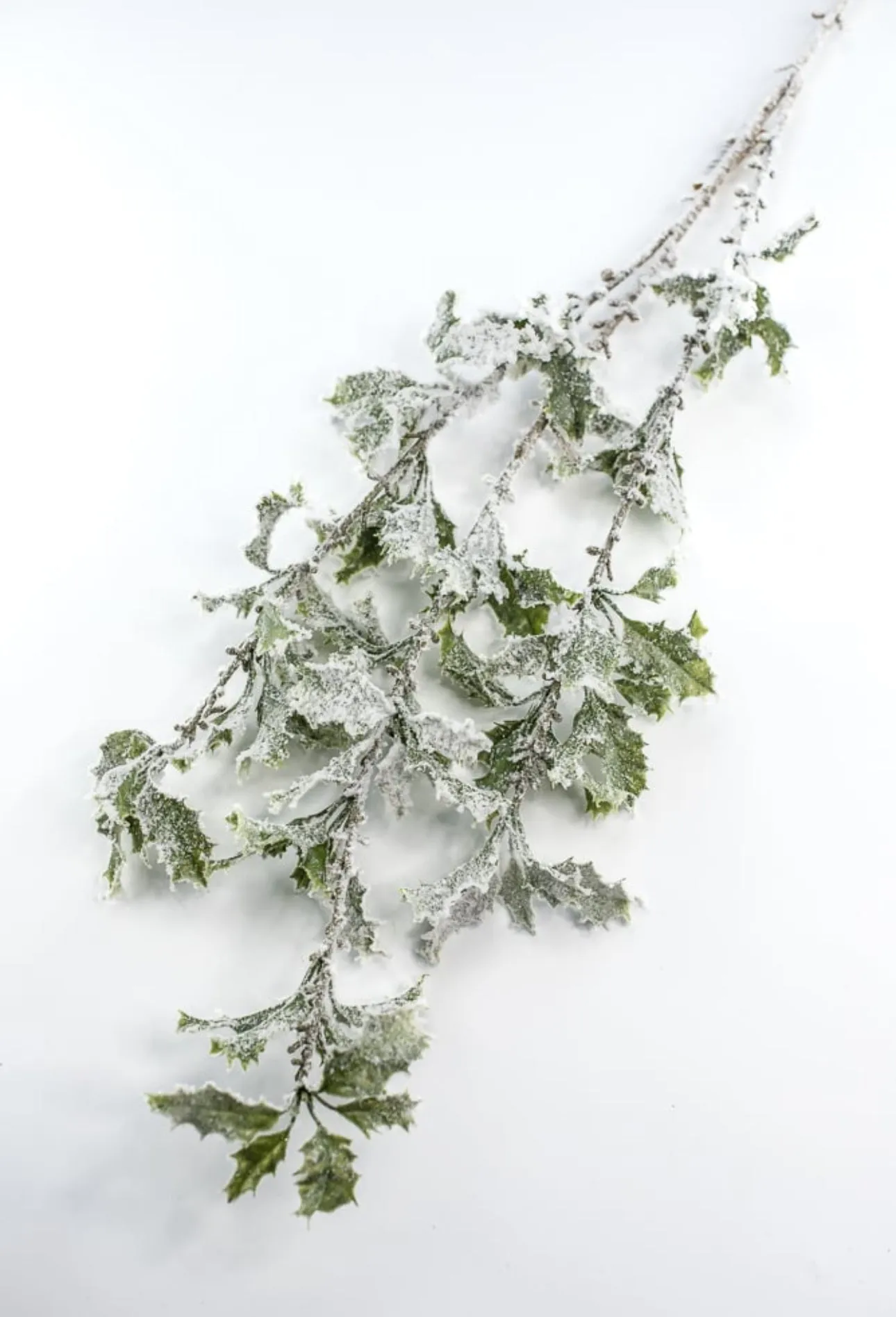 Artificial, snowy, holly greenery spray