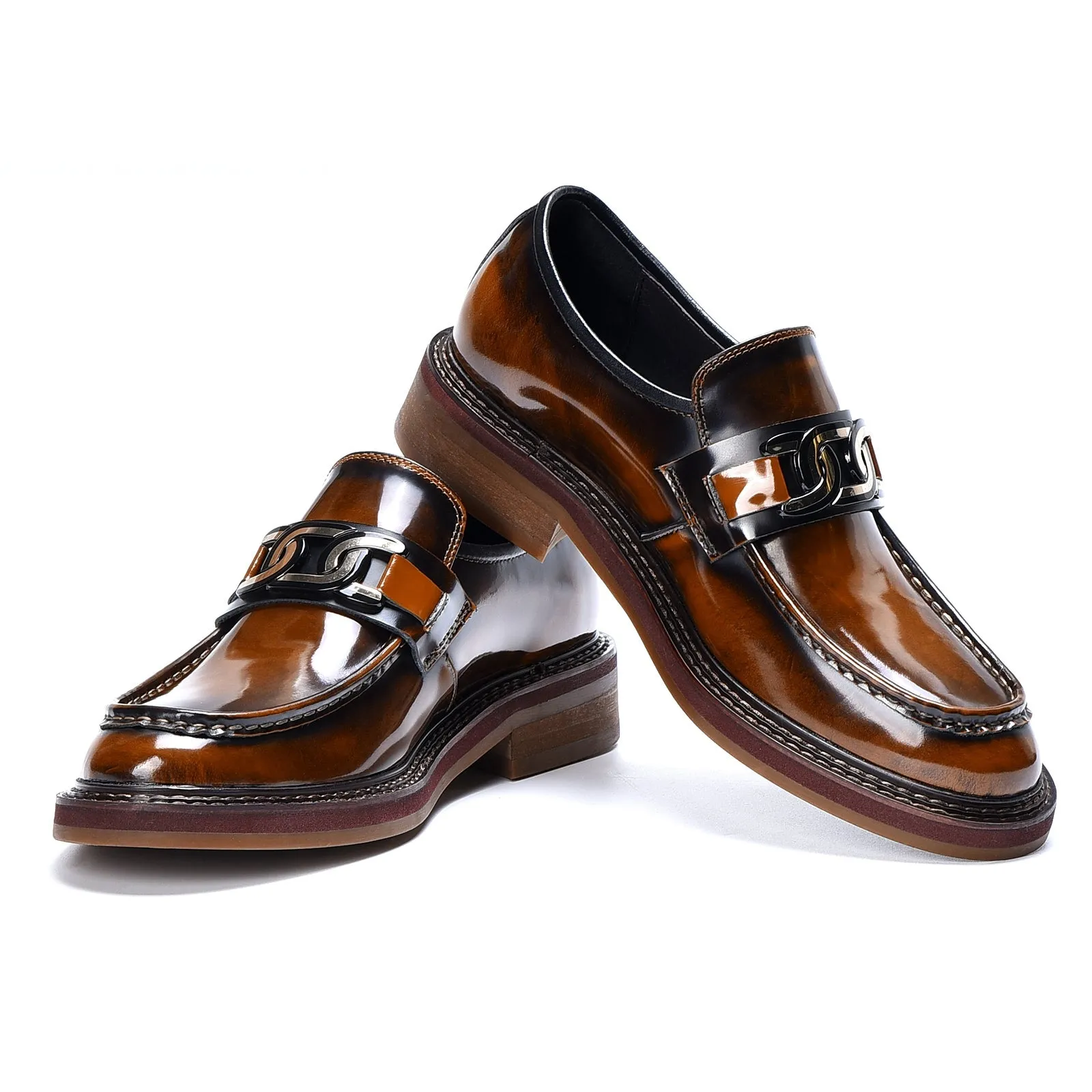 Brown leather loafers with metal buckle